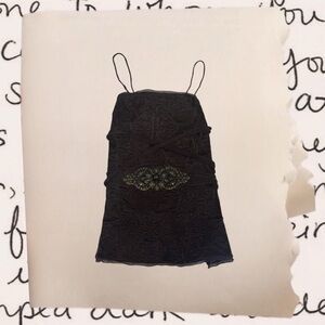 vintage floral embroidered corset with a copper flower centerpiece